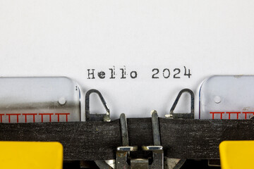 Hello 2024 written on an old typewriter	
 - obrazy, fototapety, plakaty