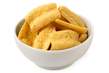 Lentil chips in a white ceramic bowl isolated on white.