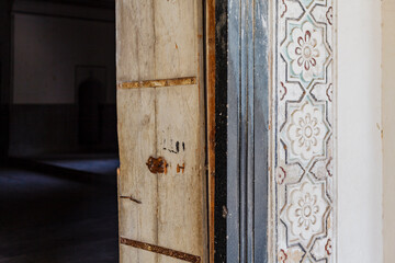 Close up of the painted floral motifs at the entrance of the Qutub Shahi Tombs in Hyderbad, Telangana, India, Asia