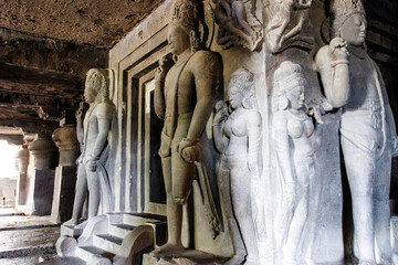 Big Hindu sculptures around the garbhagriha inside of Ellora Cave 29 (Dhumar Lena), Ellora,...