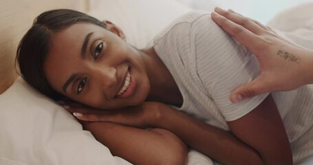 Morning, wake up and a woman in bed with her partner in their home to relax, sleep or dream. Love, peace and marriage with a couple closeup in their bedroom together on the weekend from above