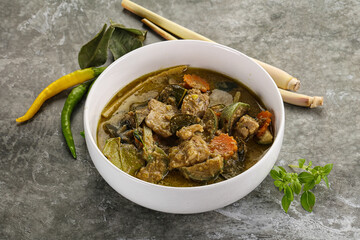 Thai green curry soup with basil