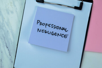 Concept of Professional Negligence write on sticky notes isolated on Wooden Table.