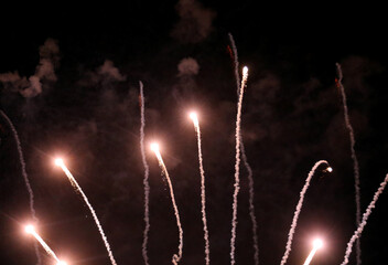 explosions of huge fireworks during the festivities at night