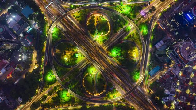 Time lapse of intersection circle. Busy traffic at night.