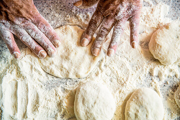 Baking at home. Homemade cakes dough in the women's hands. Process of making pies, hand. Hands pie...