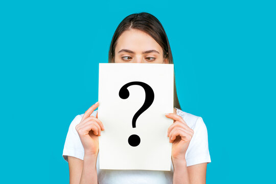 Unknown woman holding question mark. Girl holding paper question mark. Anonymous, woman question, incognita. Anonymous woman. Female incognita.Girl question, anonymous, incognita