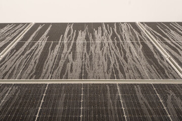 Solar panel with raindrops on nano coating. Renewable energy from the sun, green energy, concept...