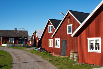 Red cottages in the fishing village Fågelsundet, Sweden