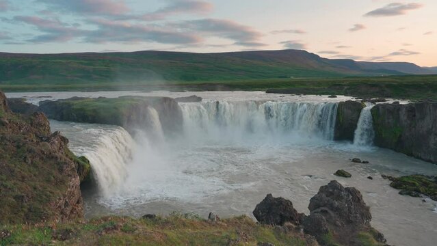 Powerful Godafoss waterfall flowing from Skjalfandafljot river in summer at Iceland