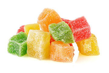 Pieces colored of candied fruits isolated on white. Multicolored dried fruit candies isolated on white background.