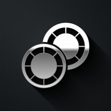 Silver Casino chips icon isolated on black background. Casino gambling. Long shadow style. Vector