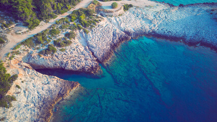 Aerial image of amazing submerged rocks and underwater caves at cape Raznjic on Korcula island most...
