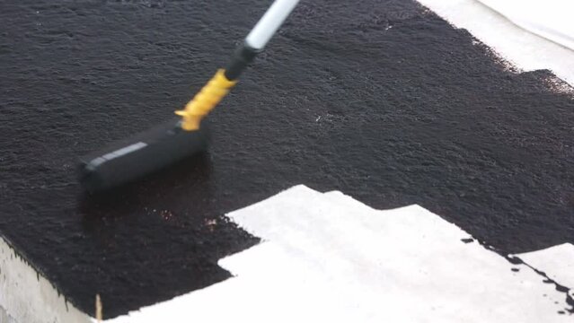 Water proofing concept of the concrete or foundation of the new house, hydro isolation of the concrete, industrial concept