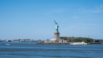 View of the Statue of Liberty, a colossal neoclassical sculpture on Liberty Island in New York...