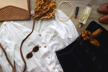 White blouse, denim skirt, brown shoes, vintage bag, leopard print scarf, pearl necklace,...