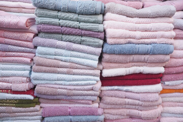 pile of gray and white color shower towel 