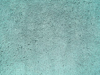 Genuine leather and genuine suede turquoise blue close-up as background