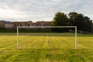 Soccer goal posts in a park in Britain, early on a Sunday morning in Autumn