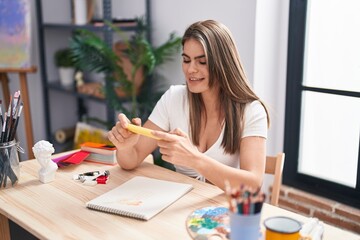 Young woman artist make photo to draw at art studio