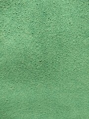 Genuine leather and genuine suede turquoise blue close-up as background