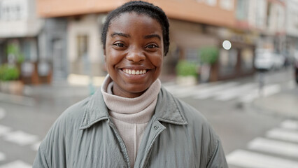 Fototapeta premium African american woman smiling confident standing at street