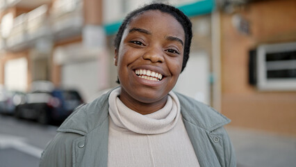 Obraz premium African american woman smiling confident standing at street