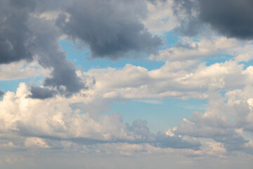 Naklejka na ściany i meble A dramatic sky and clouds on a beautiful clear day.