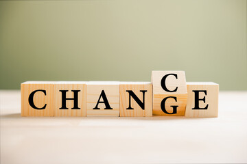 CHANCE emerges from CHANGE wooden cube flips. Personal growth and career transformation concept....