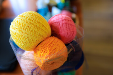 Bright Threads for knitting. Background with selective focus and copy space