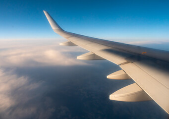 View from the window of the plane on the wing of the airliner