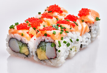  Group of delicious salmon uramaki rolls over isolated white background