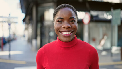 African american woman smiling confident standing at street