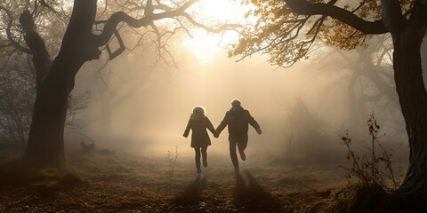 Elderly man and woman happily running into the distance holding hands, in a foggy and sunny oak forest, view from the back. Generative AI