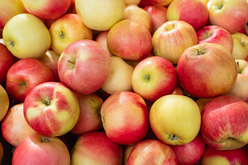 Fresh ripe apples as background. Full frame shot of red apples. Fresh red apples from the market.