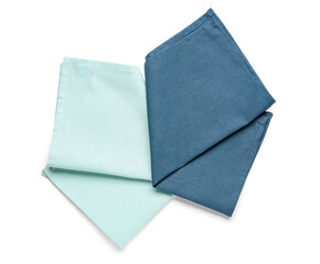 Clean folded napkins isolated on white background