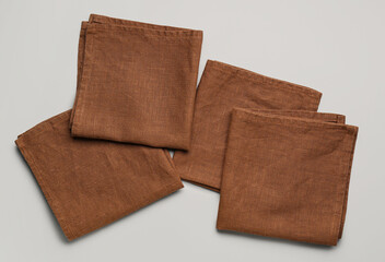 Set of clean napkins on grey background