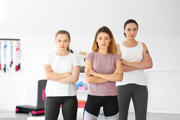 Portrait of young women in gym. Concept of self defense courses
