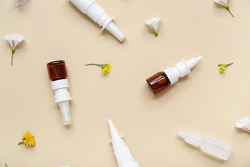 Nasal drops with flowers on beige background