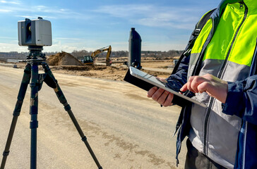engineer surveyor at the construction site