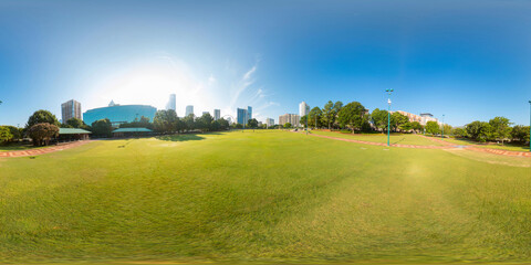 Field of plush green grass shot with a 360 vr equirectangular camera