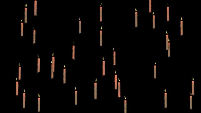 This stock motion graphics video shows a floating candles burning on an alpha channel background.