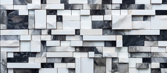 Abstract black and white seamless quartz ceramic mosaic with a stone-like texture.