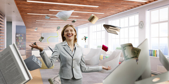 Business woman with papers and books around her