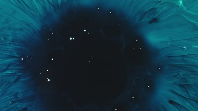 Paint water splash. Space hole. Ink design. Blue fluid splatter with dark circle in middle fantasy aqua abstract background.