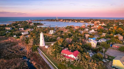 Photo sur Plexiglas Descente vers la plage Aerial view of Ocracoke Lighthouse on Ocracoke Island , North Carolina at sunset.