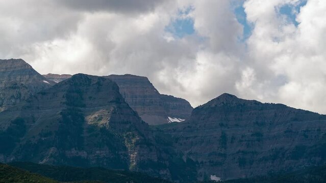 Timelapse view of Timpanogos Mountain as clouds move over the range looking towards Aspen Grove.