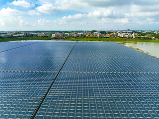 Solar panels floating in a lake seen from a drone perspective,View of the floating Solar power...