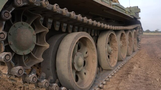 Caterpillar Tracks on a Military Tank moving ahead