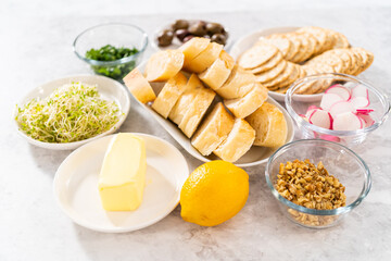 Butter board with vegetables and bread